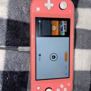 Pink Nintendo Switch Lite with Games!